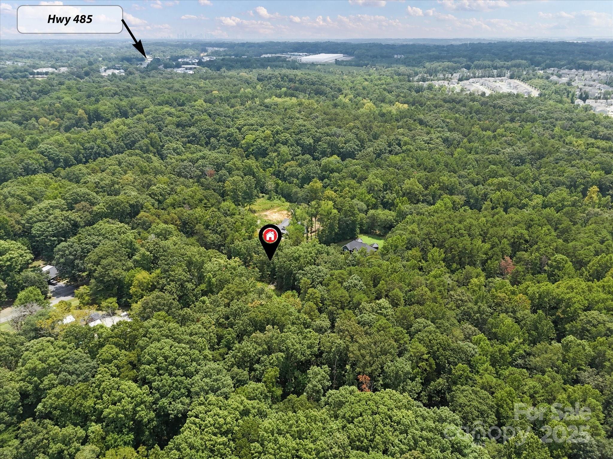 836-840 Breton Road Charlotte, NC 28214 - Photo 10 of 14 a view of a lush green field