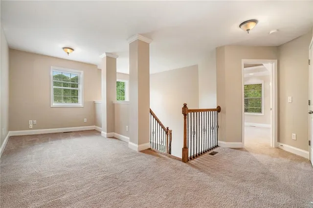 an empty room with windows