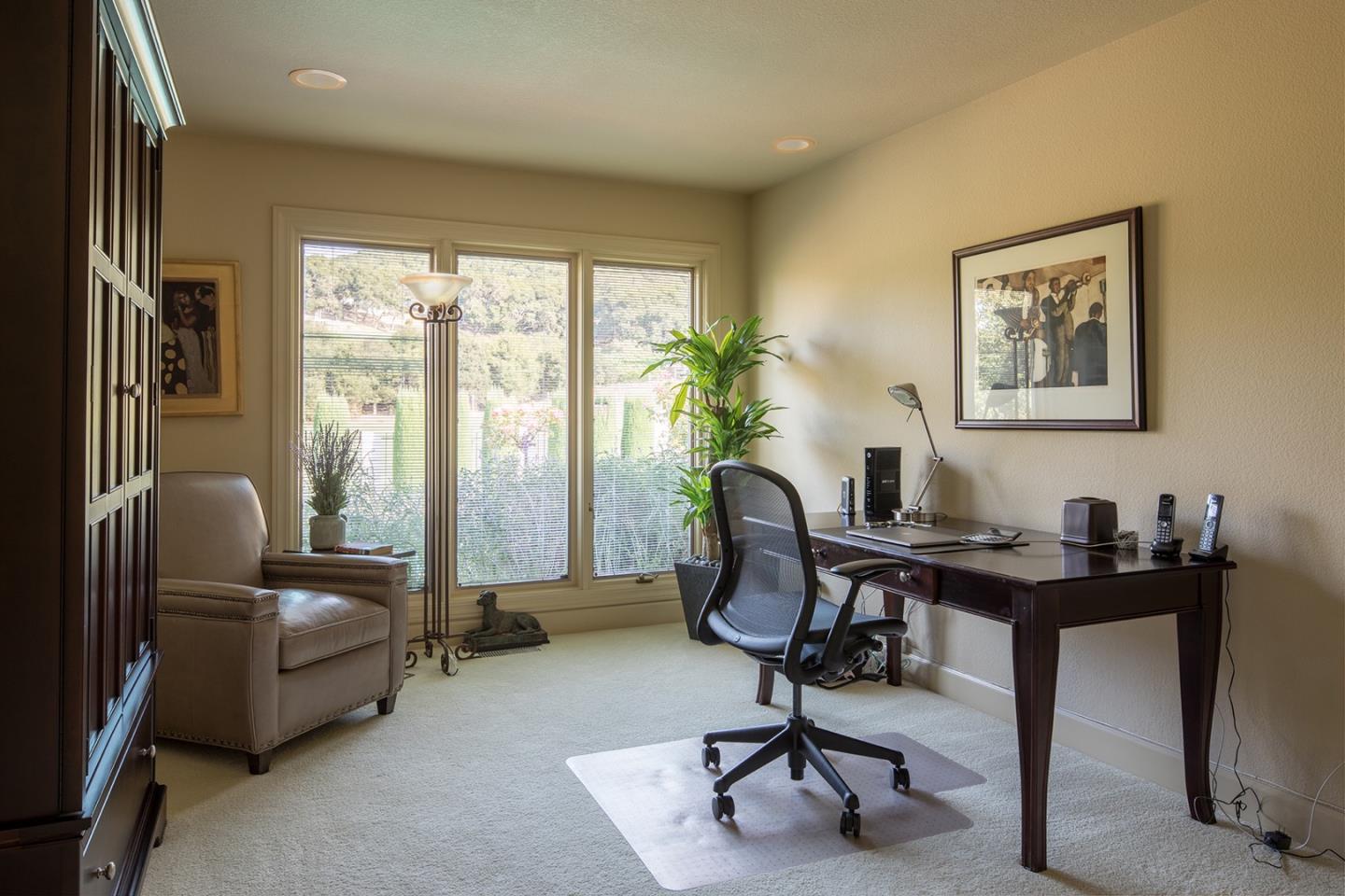 9975 Holt Road Carmel, CA 93923 - Photo 9 of 10 a view of a workspace with furniture and a window