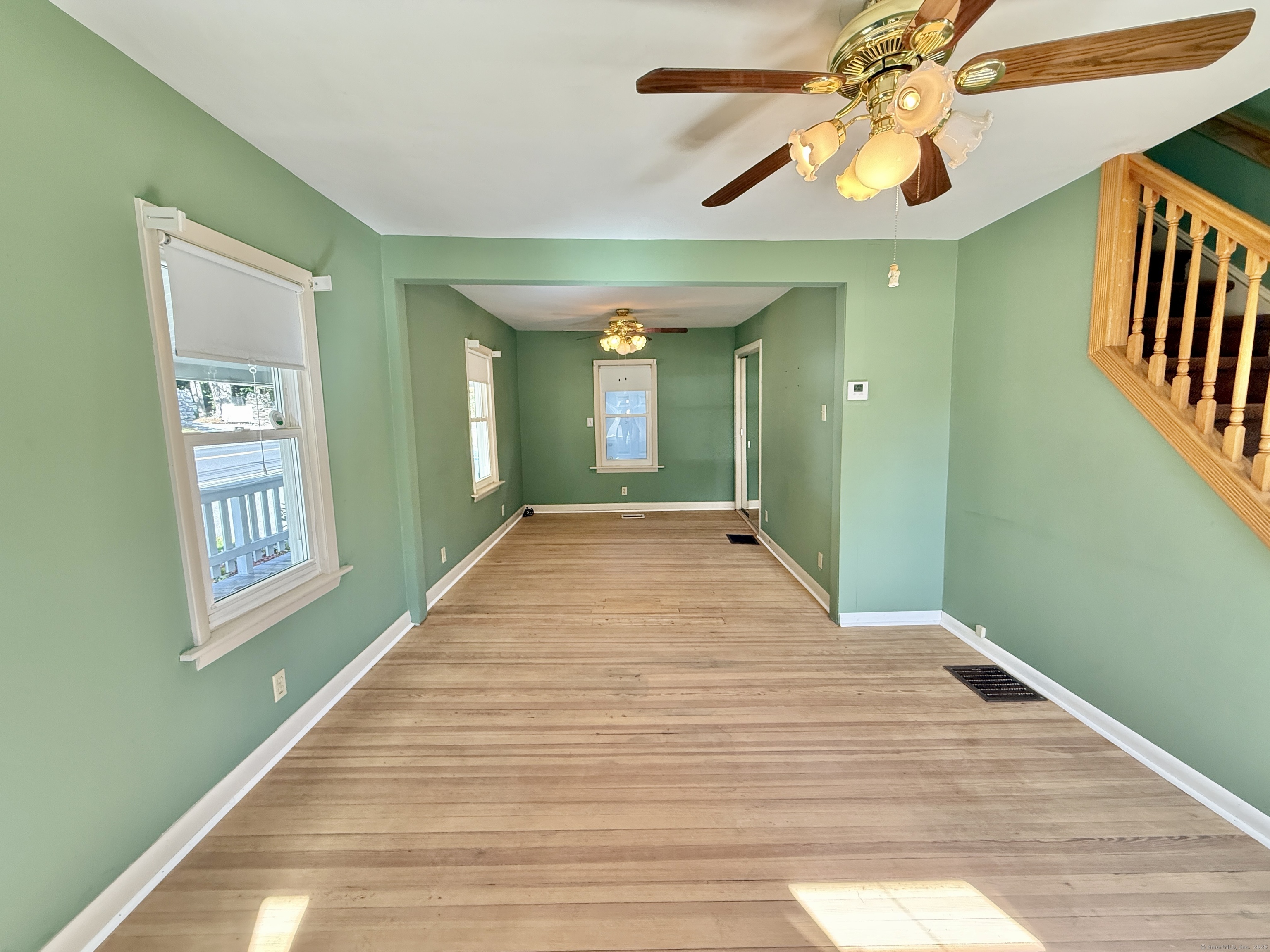 8 Main Street North Bethlehem, CT 06751 - Photo 13 of 32 a view of empty room with window and wooden floor