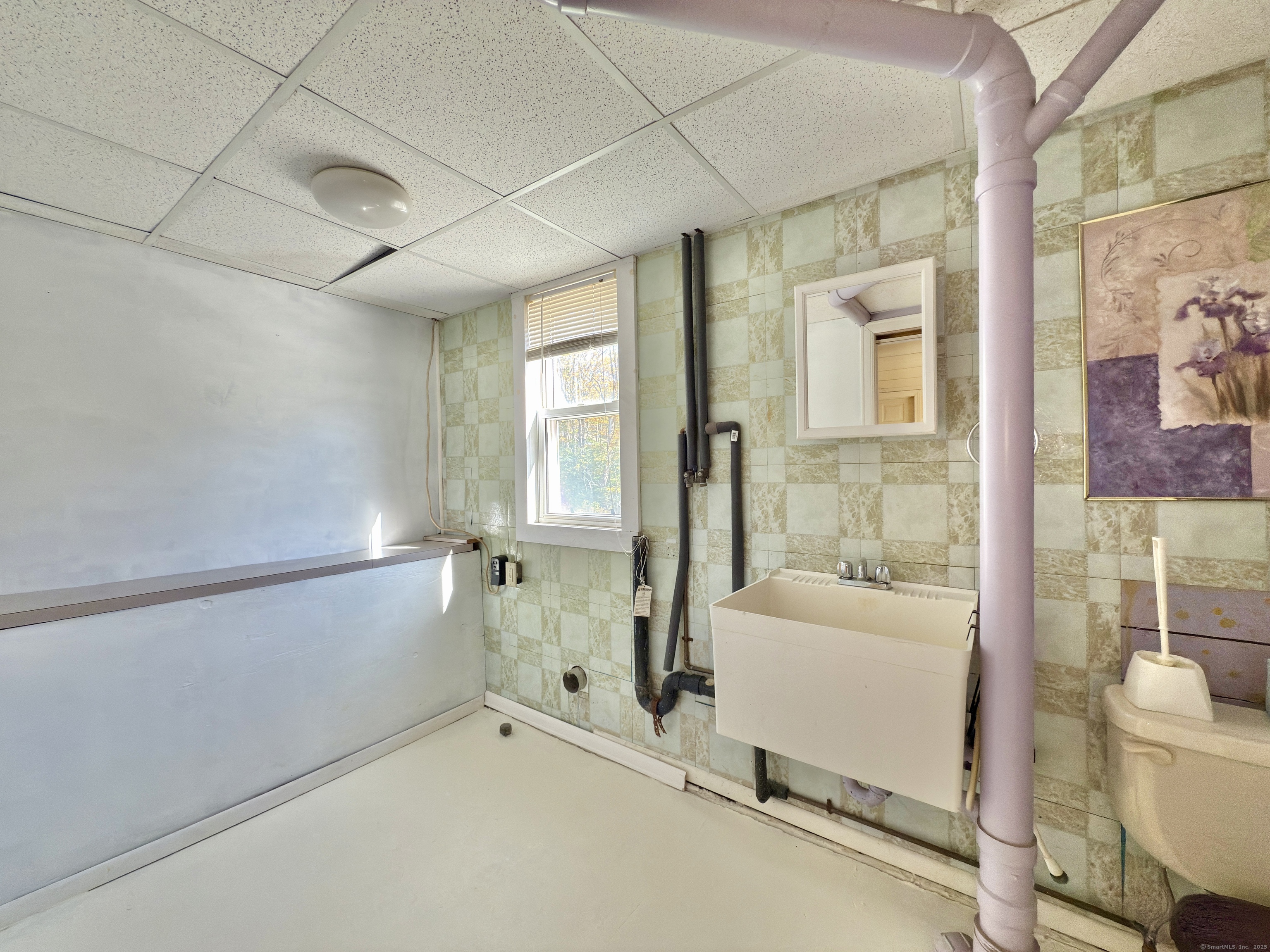 8 Main Street North Bethlehem, CT 06751 - Photo 22 of 32 a bathroom with a tub and shower