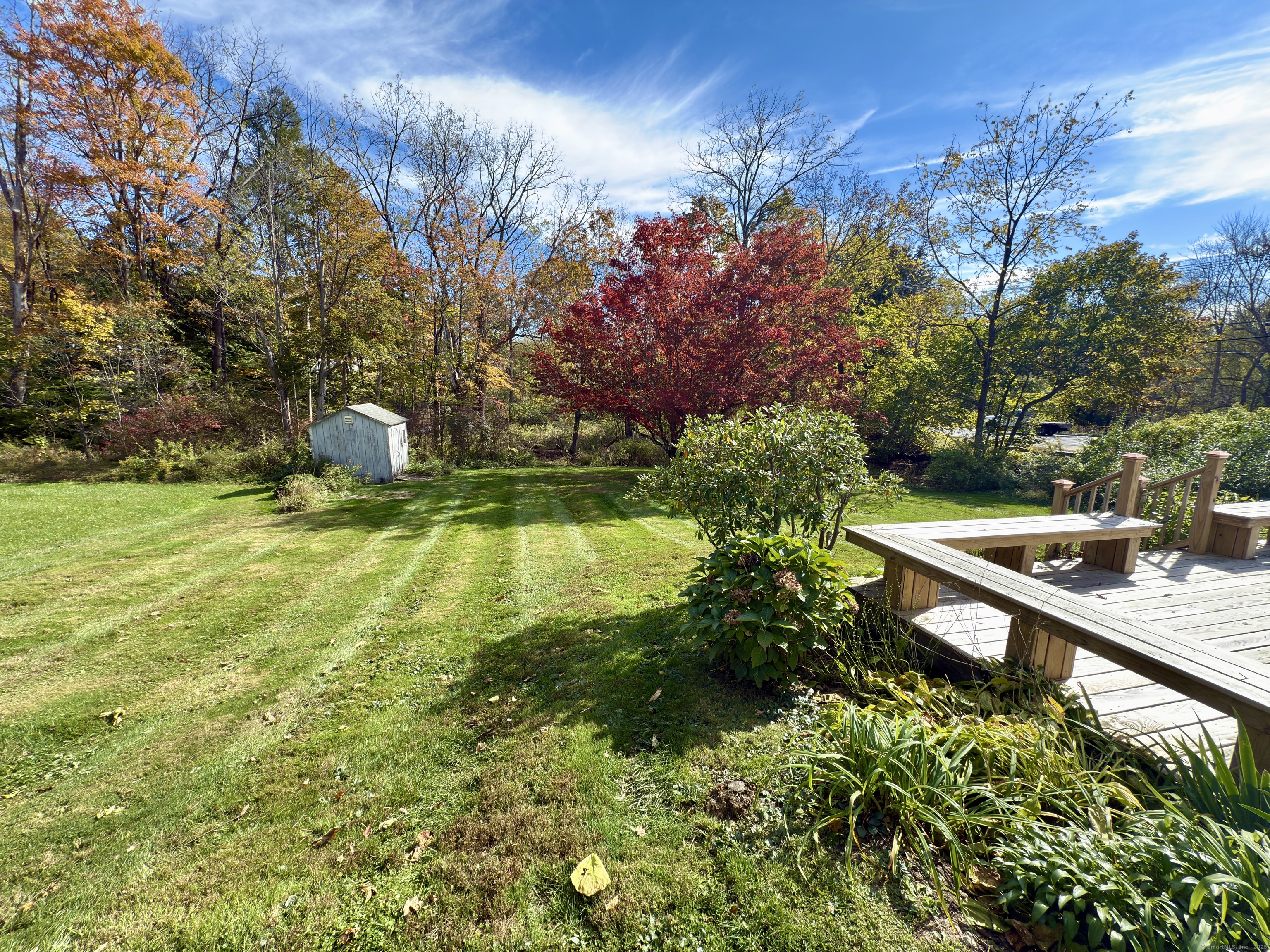 8 Main Street North Bethlehem, CT 06751 - Photo 26 of 32 a view of a garden with a bench