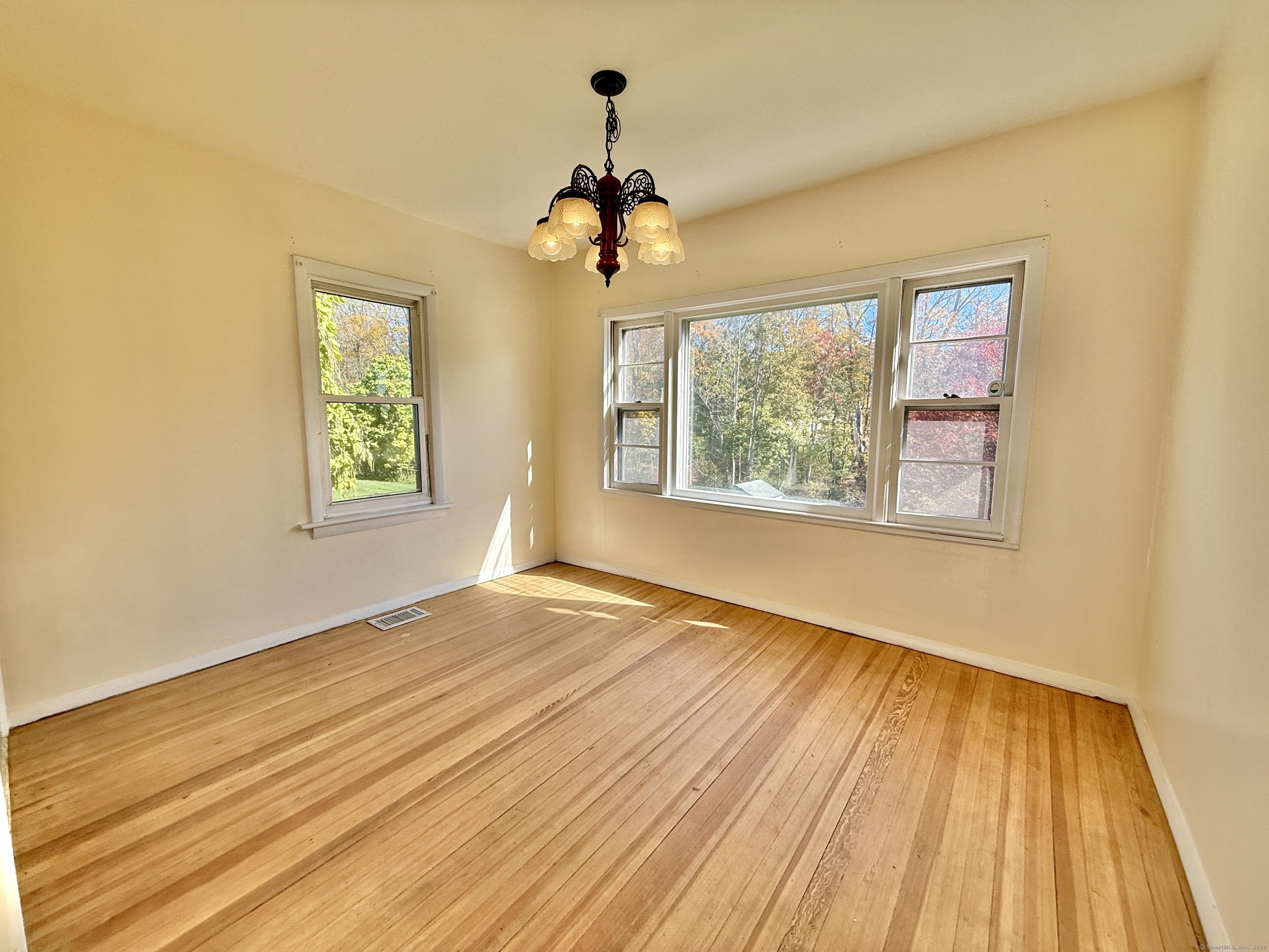 8 Main Street North Bethlehem, CT 06751 - Photo 9 of 32 a view of empty room with wooden floor and fan