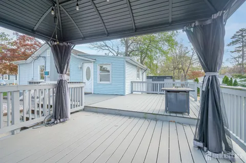 a view of backyard with green space