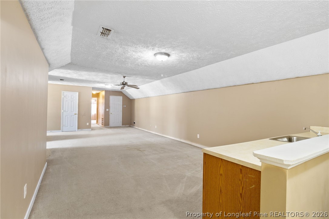 8017 Trout Creek Road Fayetteville, NC 28304 - Photo 28 of 38 a view of a utility room with closet and windows