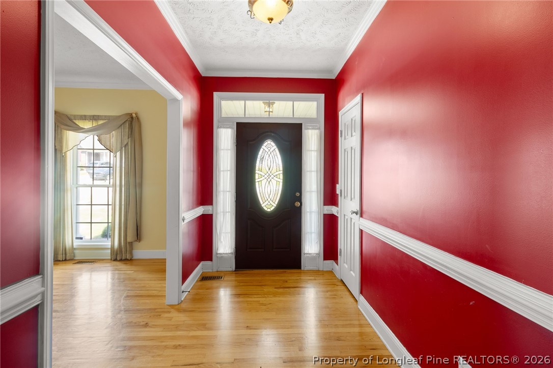 8017 Trout Creek Road Fayetteville, NC 28304 - Photo 4 of 38 a view of entryway with a front door
