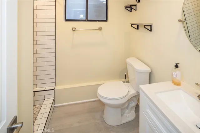 a bathroom with a sink and toilet