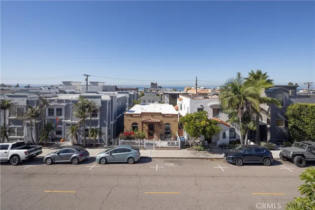 a view of a street with cars