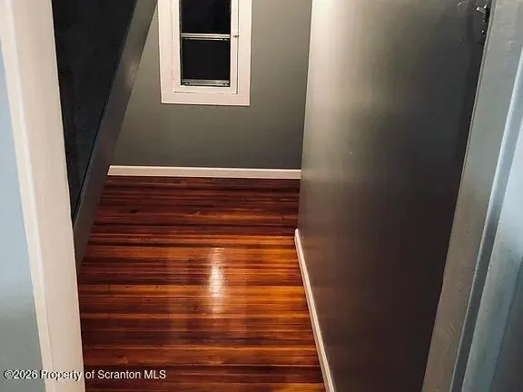 a view of entryway with wooden floor