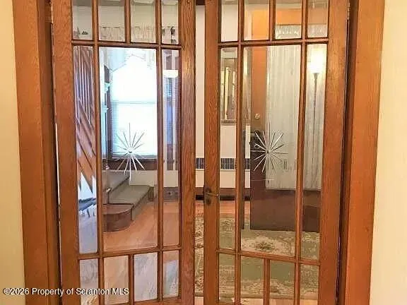 a view of balcony with wooden floor