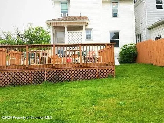 a view of a deck with a fence