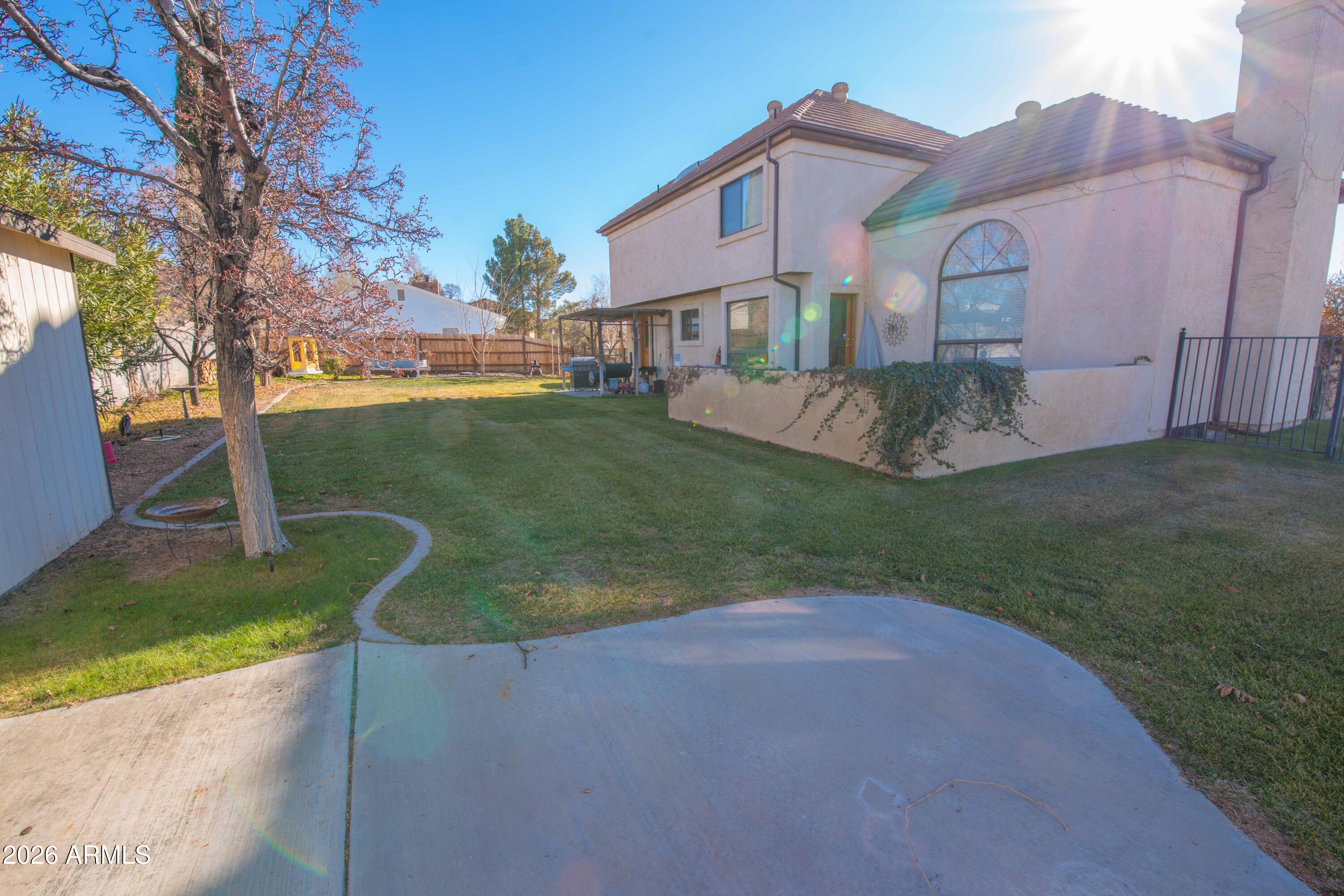 1531 Rim View Drive Page, AZ 86040 - Photo 2 of 35 a view of a big house with a big yard and large trees