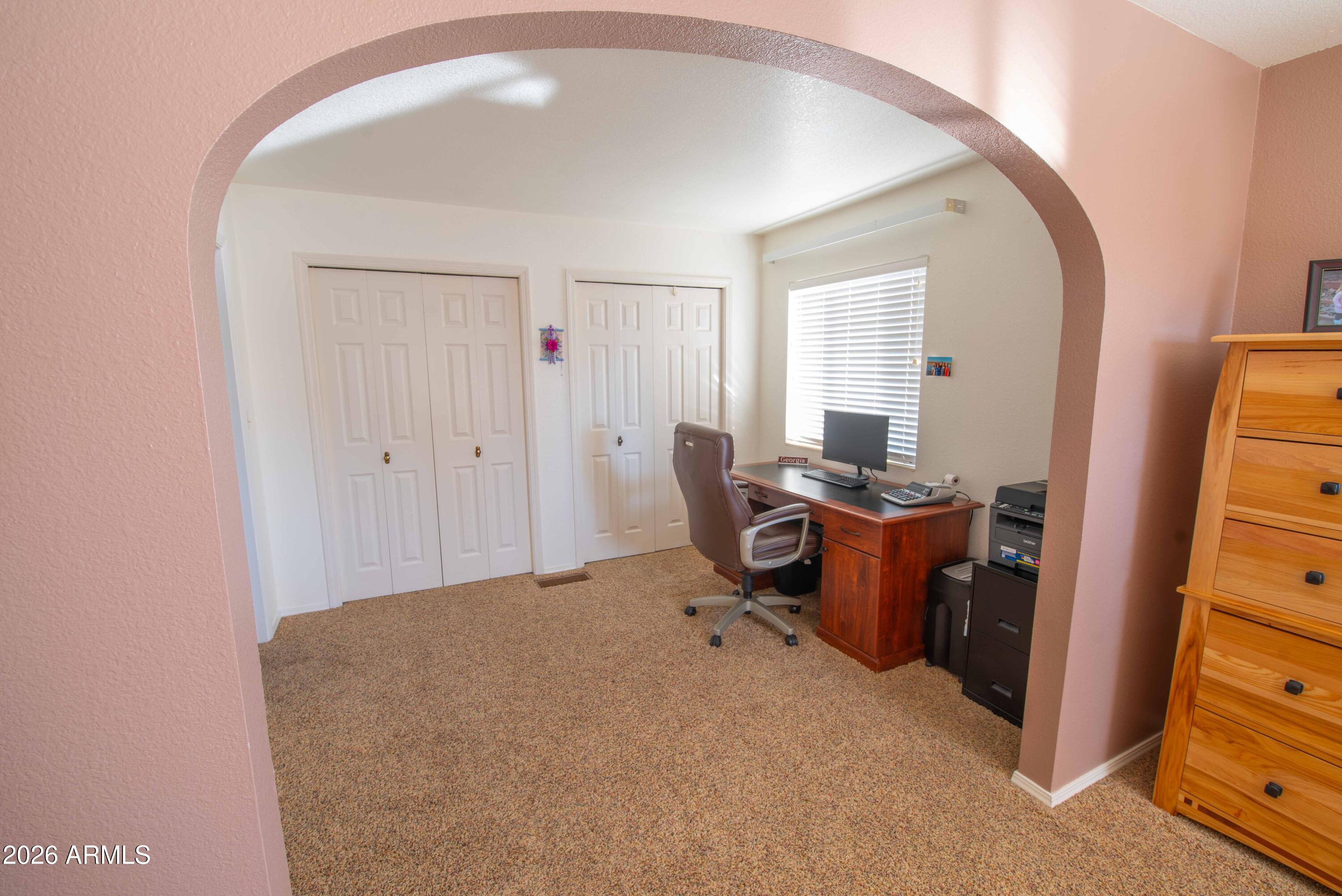 1531 Rim View Drive Page, AZ 86040 - Photo 29 of 35 a workspace with furniture and mirror