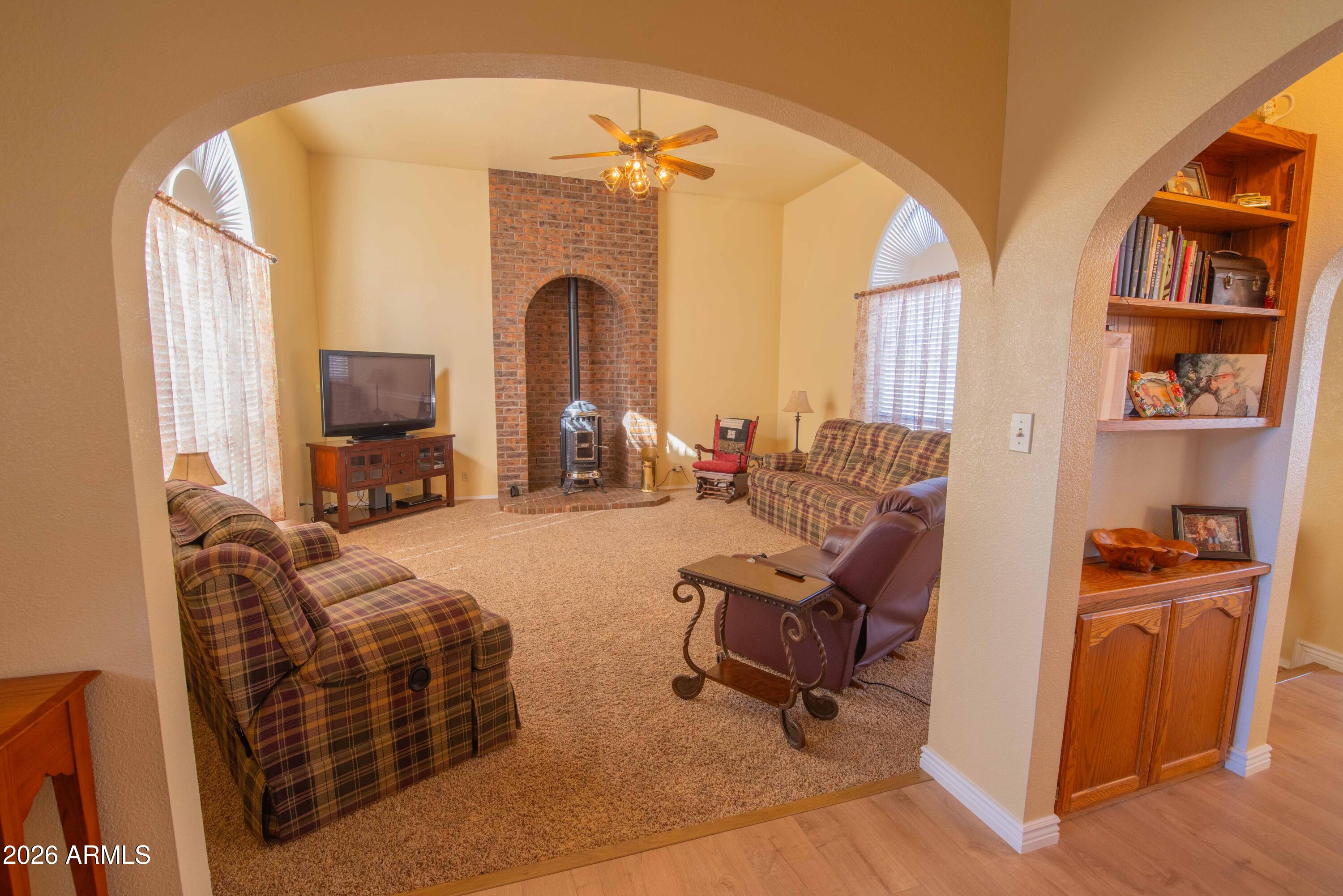 1531 Rim View Drive Page, AZ 86040 - Photo 5 of 35 a living room with furniture and a fireplace