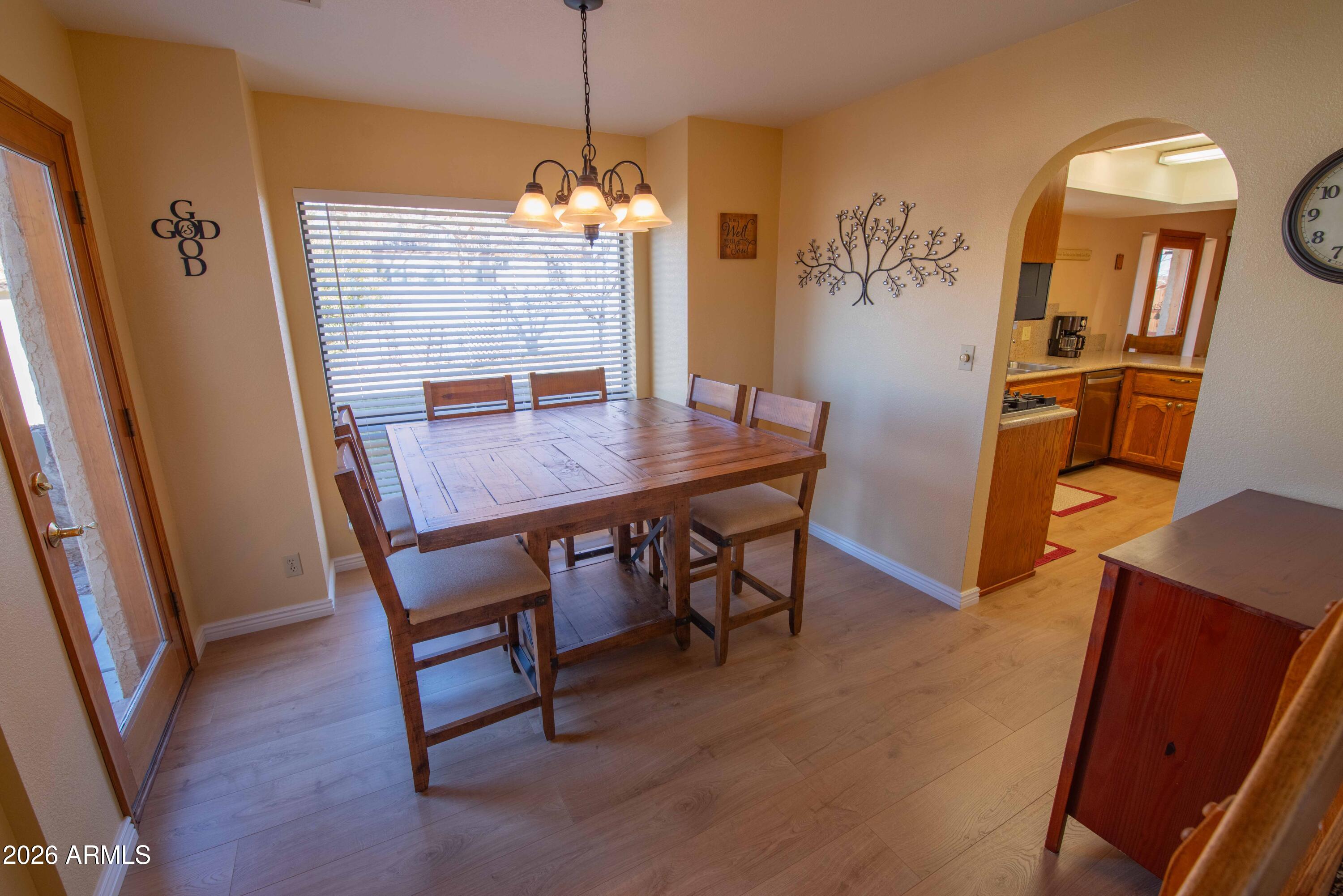 1531 Rim View Drive Page, AZ 86040 - Photo 10 of 35 a view of a dining room with furniture and chandelier