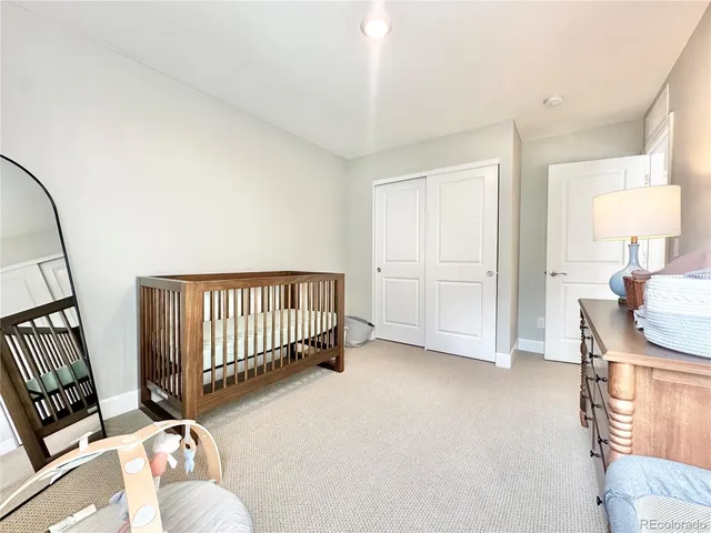 a view of a livingroom with furniture and window