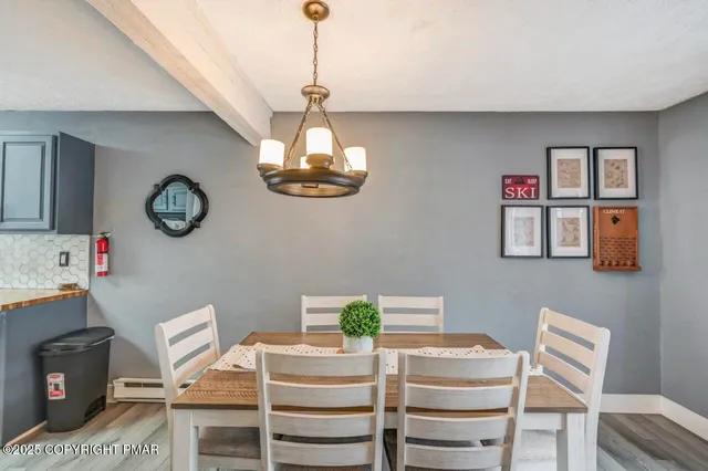 a view of a dining room with furniture