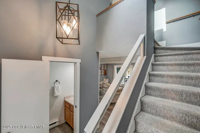 a view of an entryway with staircase