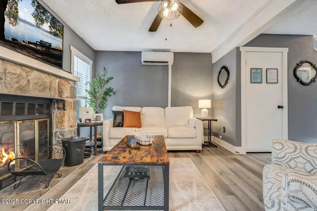 a bed room with a bed and a chandelier