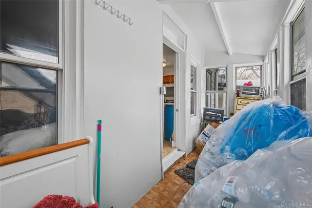 a view of entryway with a front door