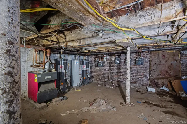 a view of a garage with wooden table and chairs