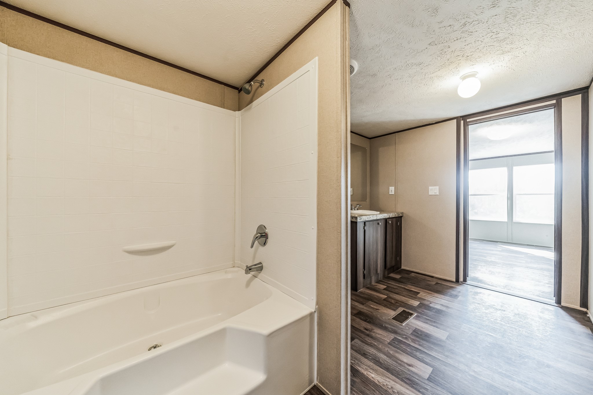 260 Pr Frio Estates Moore, TX 78057 - Photo 11 of 33 a bathroom with a bathtub and a shower