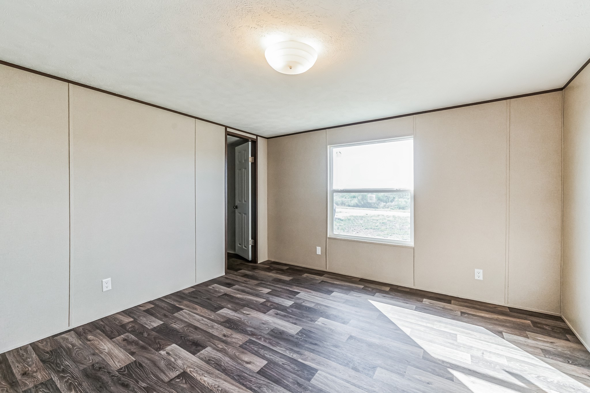 260 Pr Frio Estates Moore, TX 78057 - Photo 20 of 33 a view of an empty room with a window and closet area