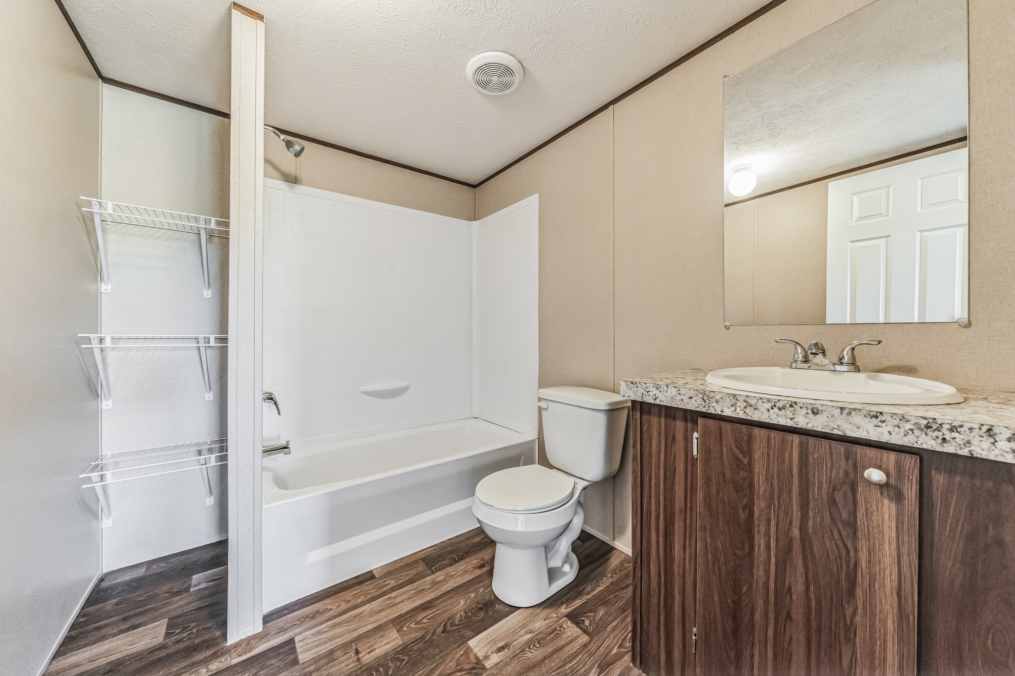 260 Pr Frio Estates Moore, TX 78057 - Photo 8 of 33 a bathroom with a granite countertop sink toilet and shower
