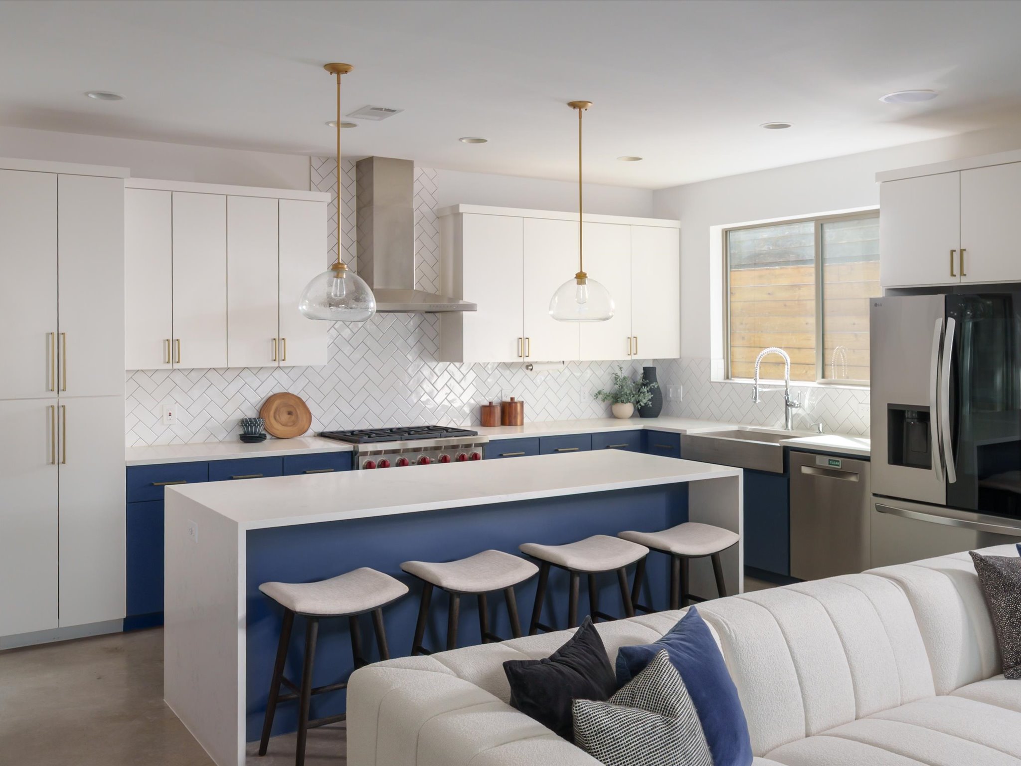 615 Jewell Street Austin, TX 78704 - Photo 6 of 25 The sleek and stylish island kitchen is ideal for entertaining with bar seating for casual bites and conversation.