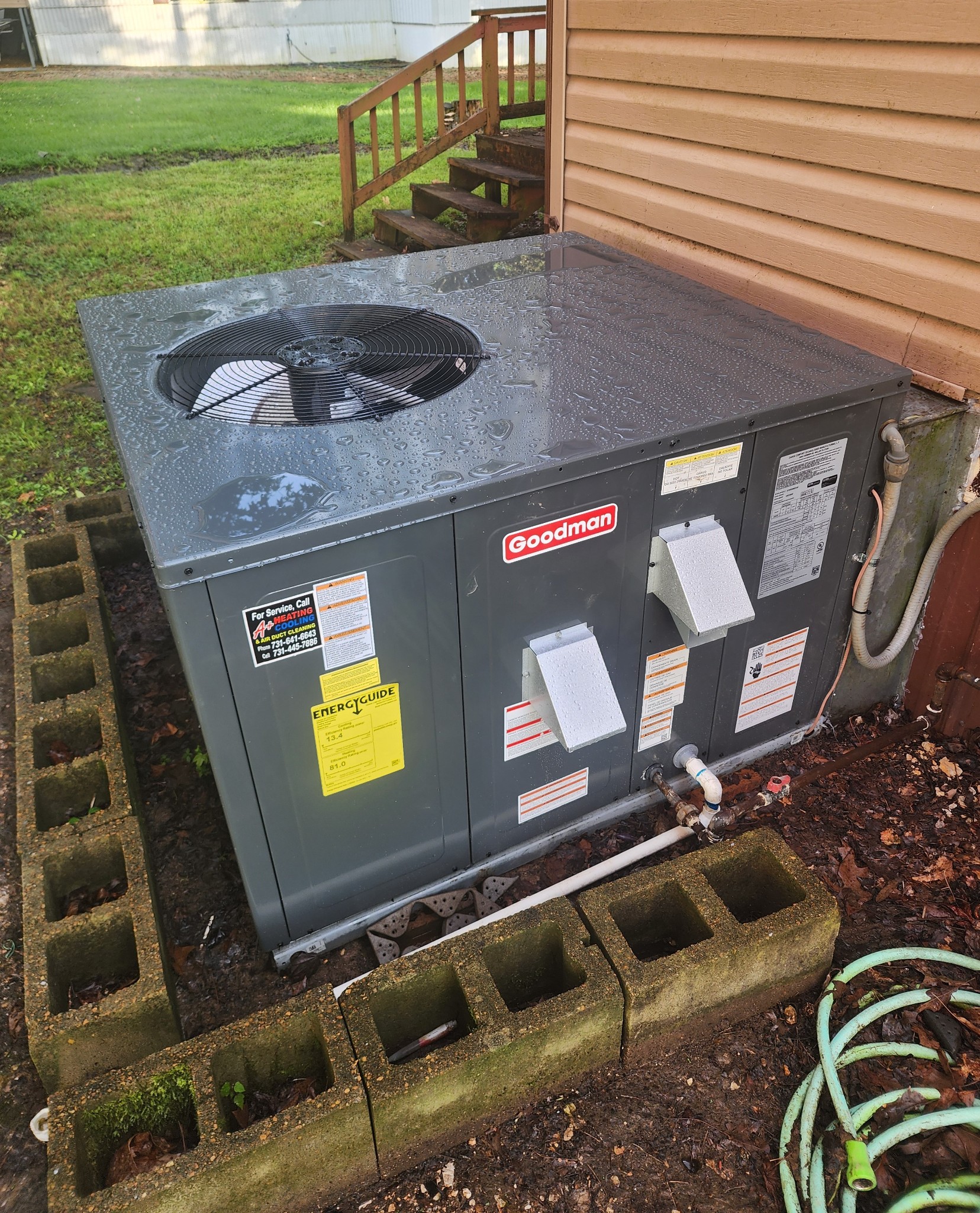 45 Walker Road Springville, TN 38256 - Photo 19 of 20 a backyard of a house with outdoor seating