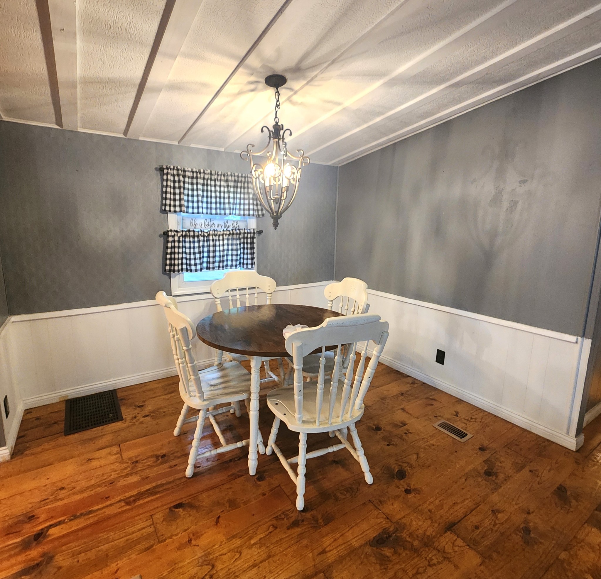 45 Walker Road Springville, TN 38256 - Photo 8 of 20 a view of a dining room with furniture and wooden floor