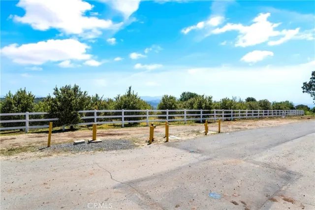 a view of a roof with sitting area
