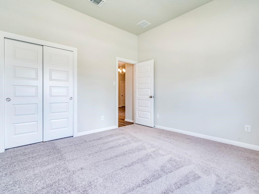 270 Rimrock Court Bastrop, TX 78602 - Photo 25 of 34 Secondary bedroom.