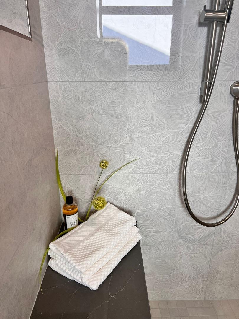 2038 Hoover Drive Santa Clara, CA 95051 - Photo 12 of 17 a bathroom with a sink and a mirror