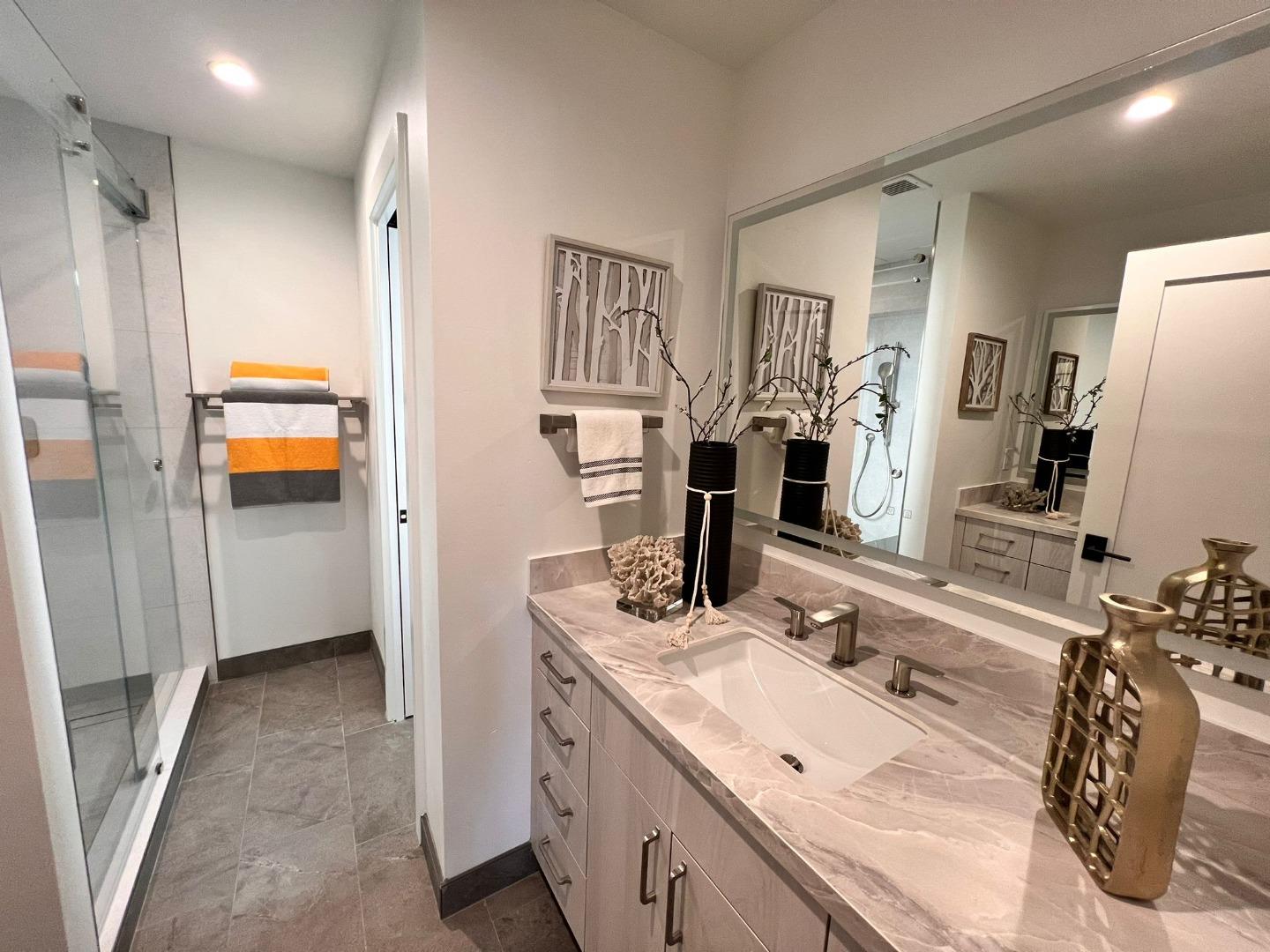 2038 Hoover Drive Santa Clara, CA 95051 - Photo 13 of 17 a bathroom with double vanity sink and a mirror