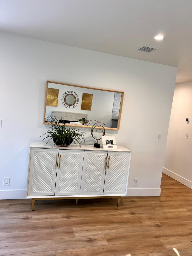2038 Hoover Drive Santa Clara, CA 95051 - Photo 14 of 17 a view of utility room with wooden floor