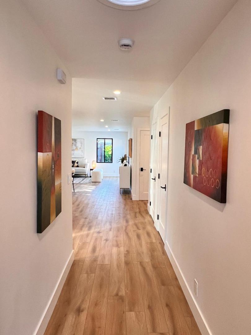 2038 Hoover Drive Santa Clara, CA 95051 - Photo 15 of 17 a view of a refrigerator in kitchen and wooden floor