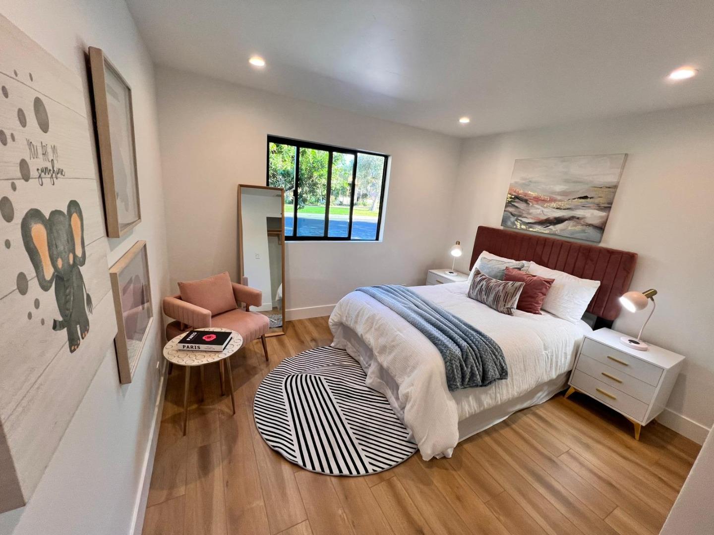 2038 Hoover Drive Santa Clara, CA 95051 - Photo 7 of 17 a bedroom with bed and a window