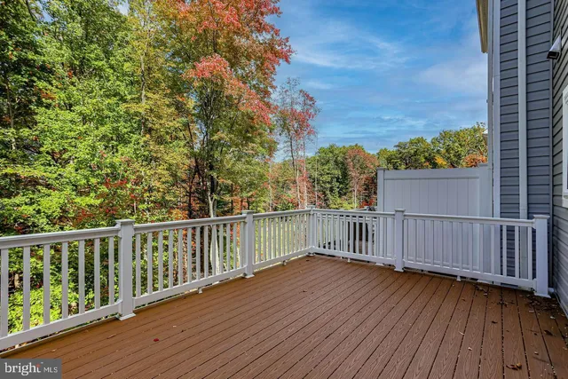 a view of a wooden roof deck