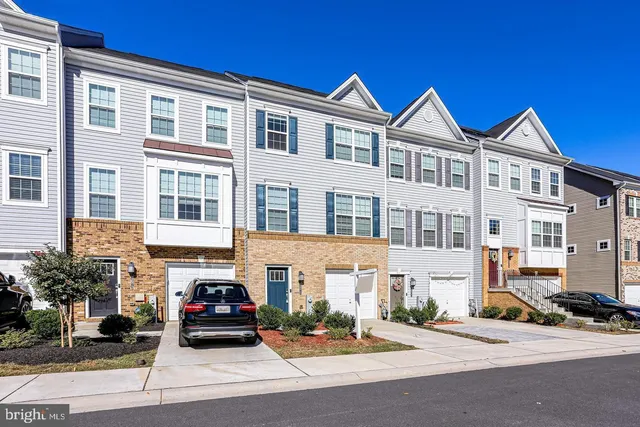 a view of a car parked in front of a building