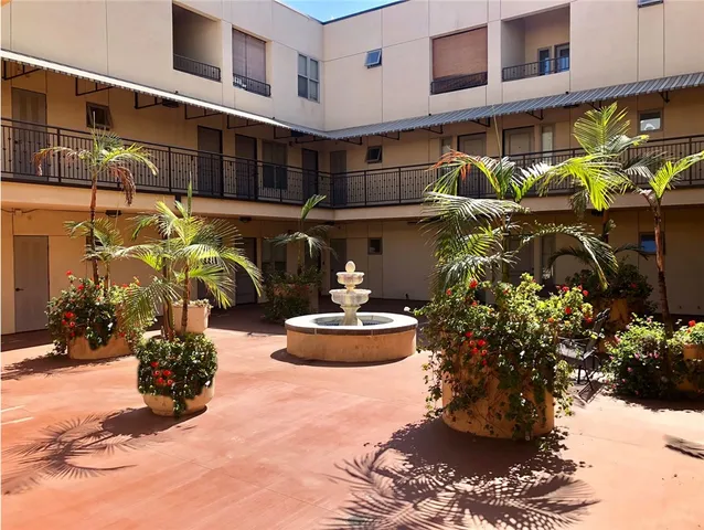 a view of a terrace with seating area