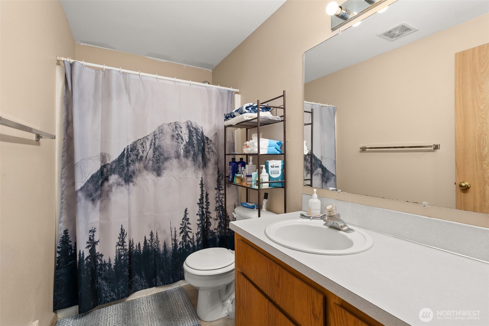 150-126 Allen Road Onalaska, WA 98570 - Photo 25 of 34 a bathroom with a sink toilet and shower