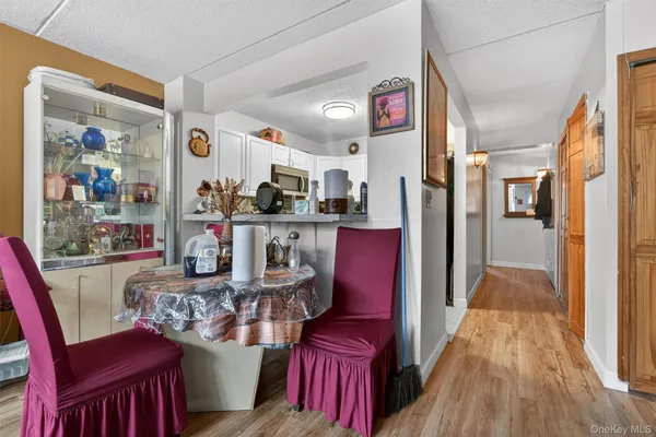 a kitchen with stainless steel appliances a stove microwave and a refrigerator
