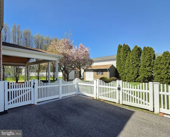 a view of a wrought iron fences in front of house
