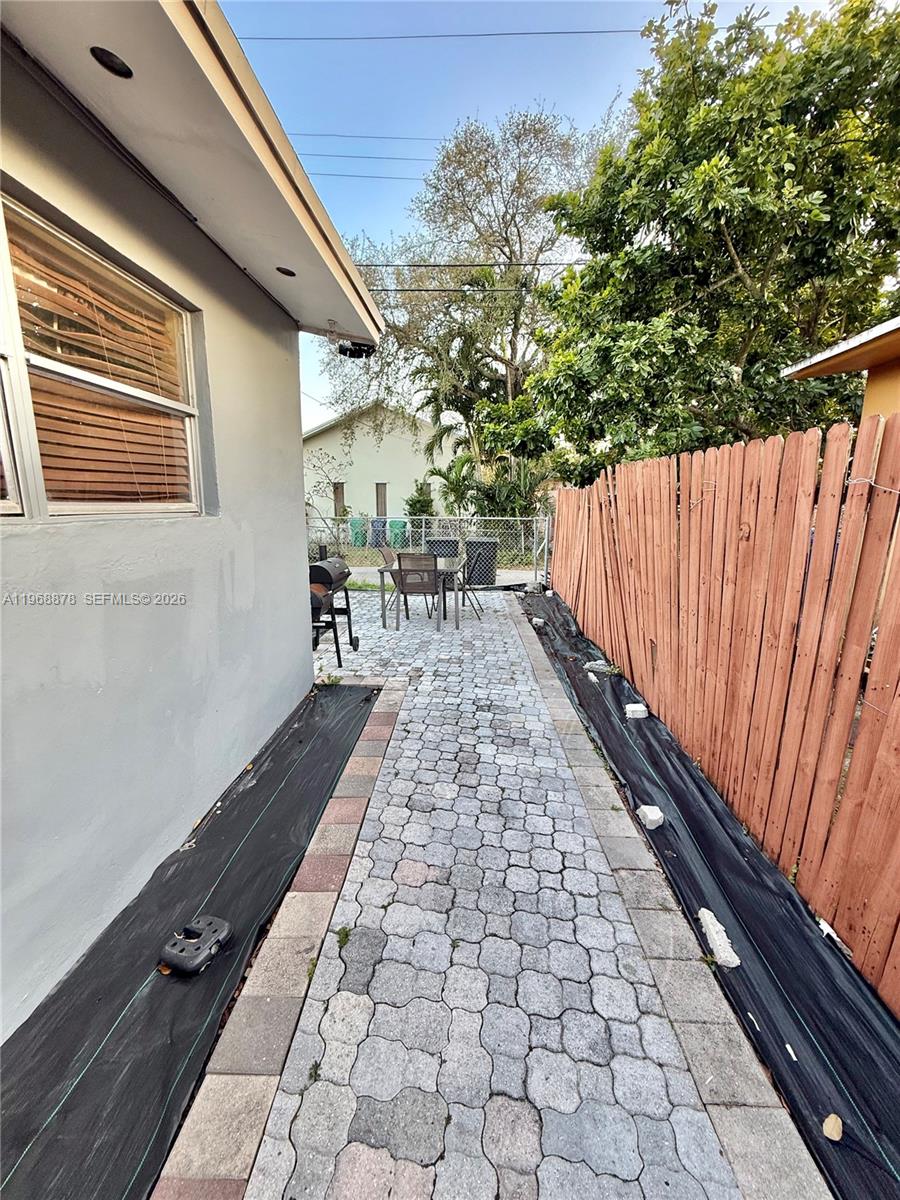 2306 Simms Street Hollywood, FL 33020 - Photo 24 of 26 Side yard for entrances