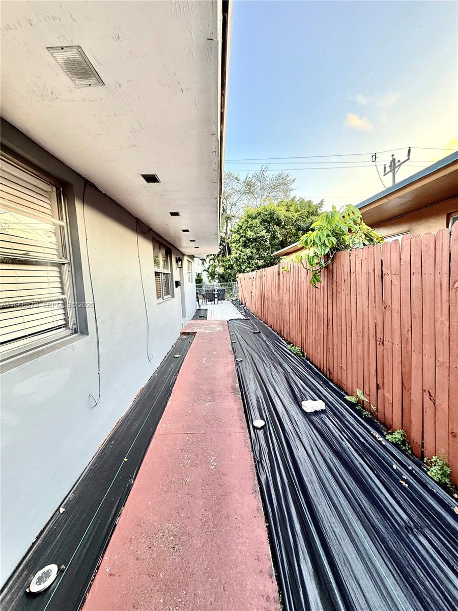 2306 Simms Street Hollywood, FL 33020 - Photo 25 of 26 Side yard for entrance.