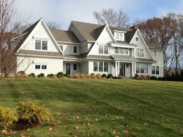 37 Prospect Road Westport, CT 06880 - Photo 1 of 1 a front view of a house with a garden