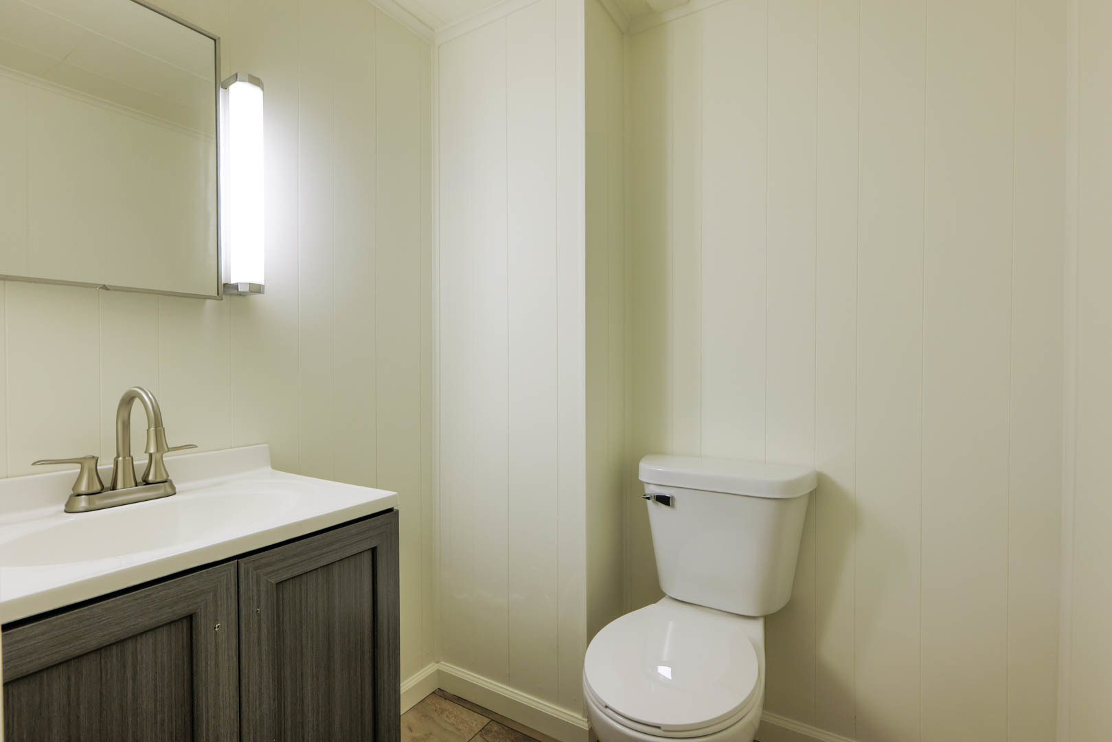 407 Grandview Drive Normal, IL 61761 - Photo 27 of 33 a bathroom with a toilet a sink and mirror