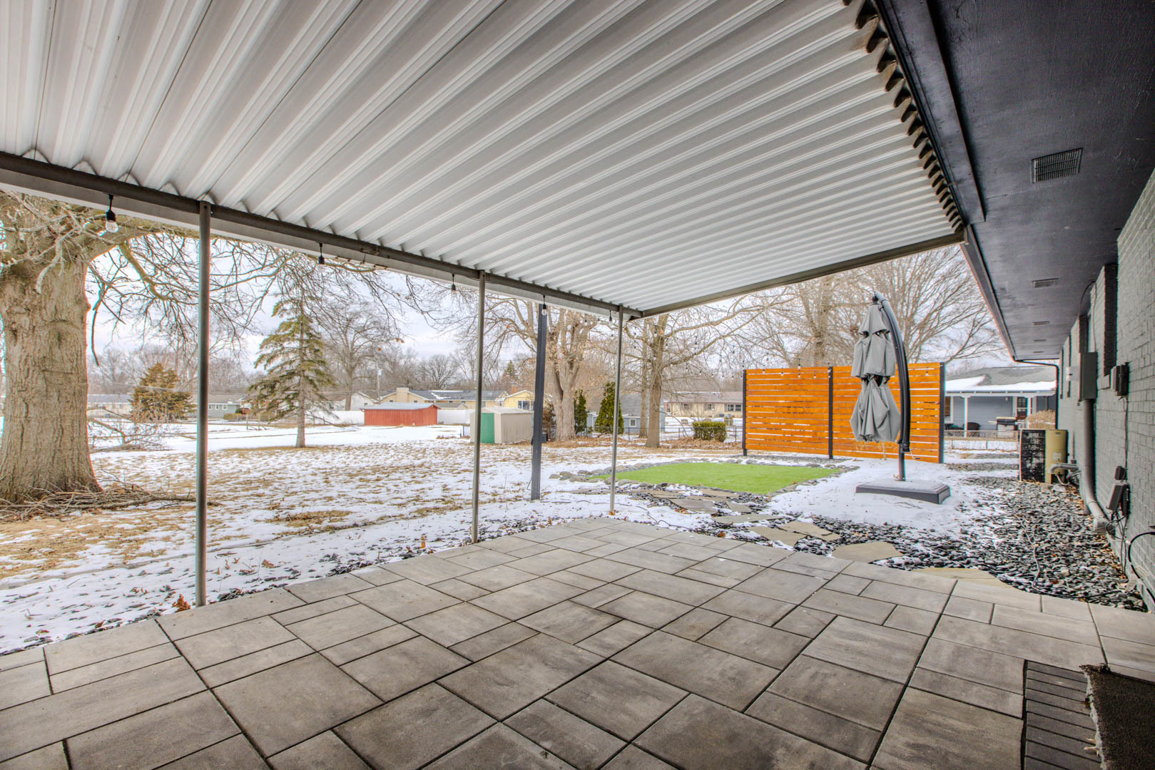 407 Grandview Drive Normal, IL 61761 - Photo 28 of 33 a view of a porch with wooden floor and iron fence