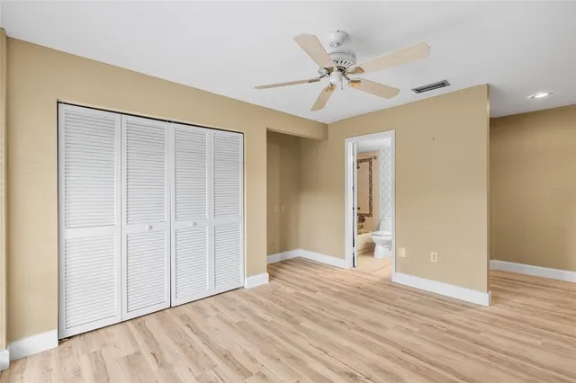 swimming pool view with a seating space